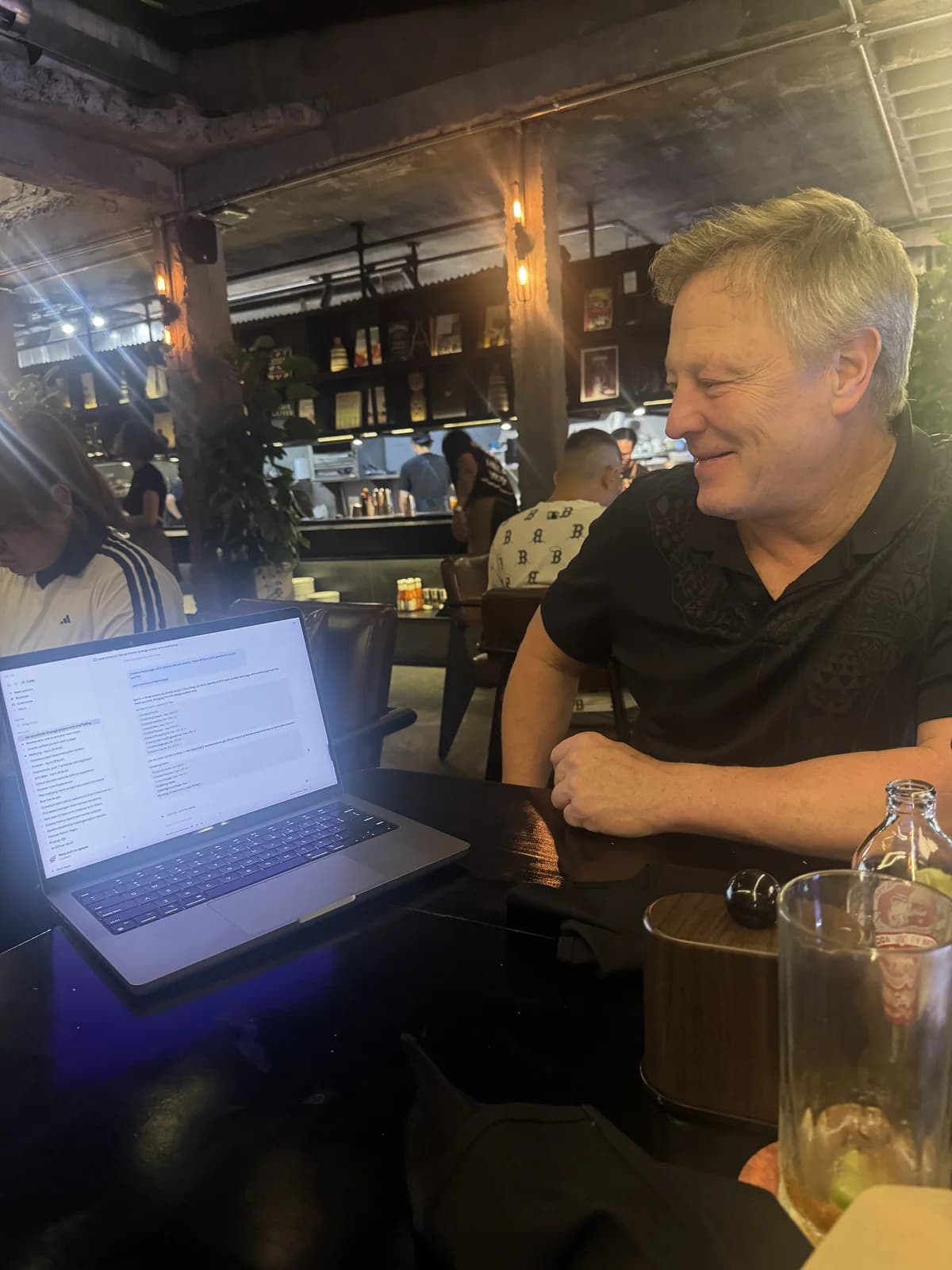 James coding at the dinner table during the five-day Vietnam sprint
