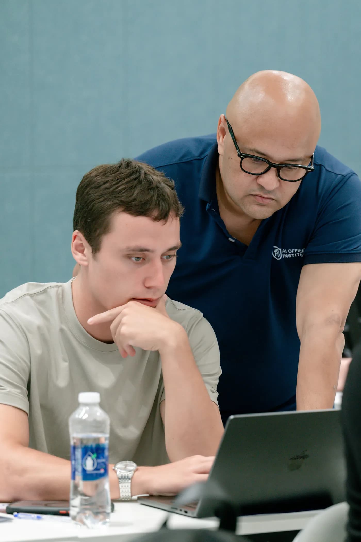 Dave Hajdu coaching a participant at their laptop