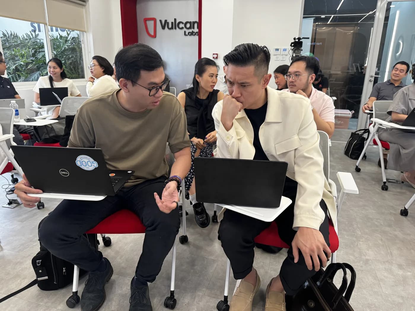 Two community members working through a session together