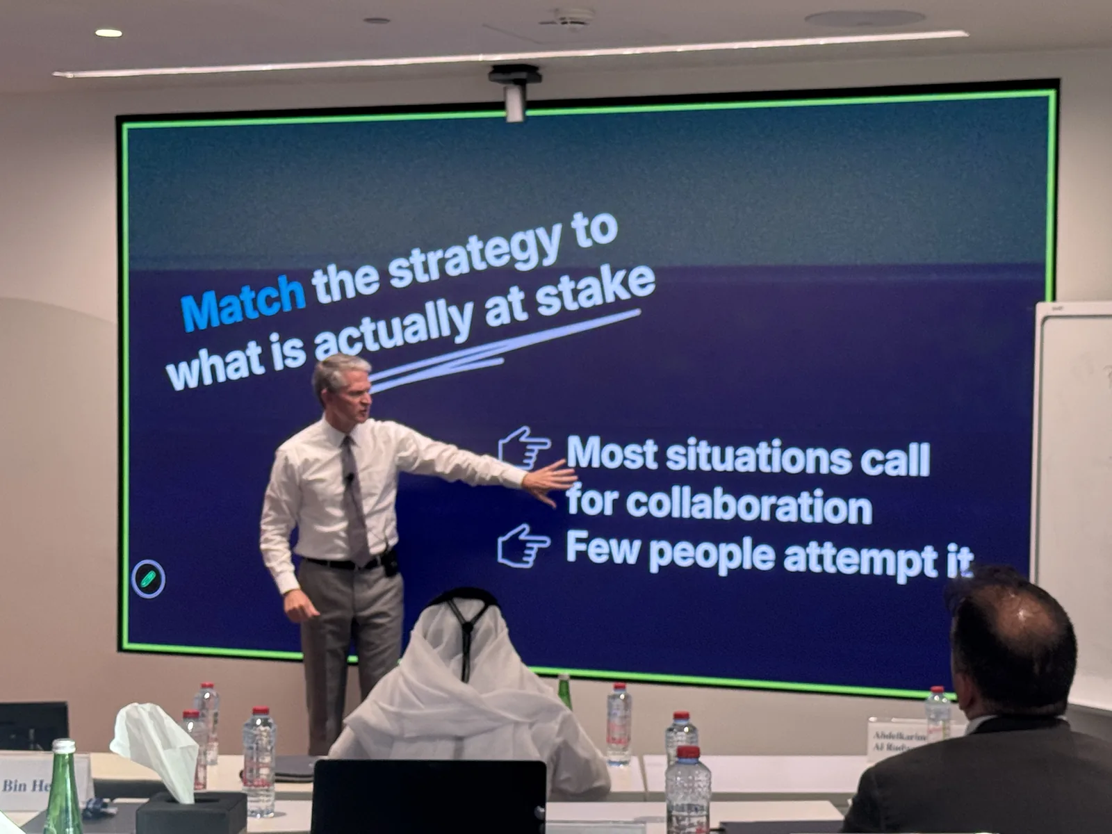 Dr. Brooks Holtom teaching in Dubai, bringing the academic rigor behind the leadership frameworks.